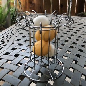 Silver wire basket with realistic eggs - Fun kitchen decor!